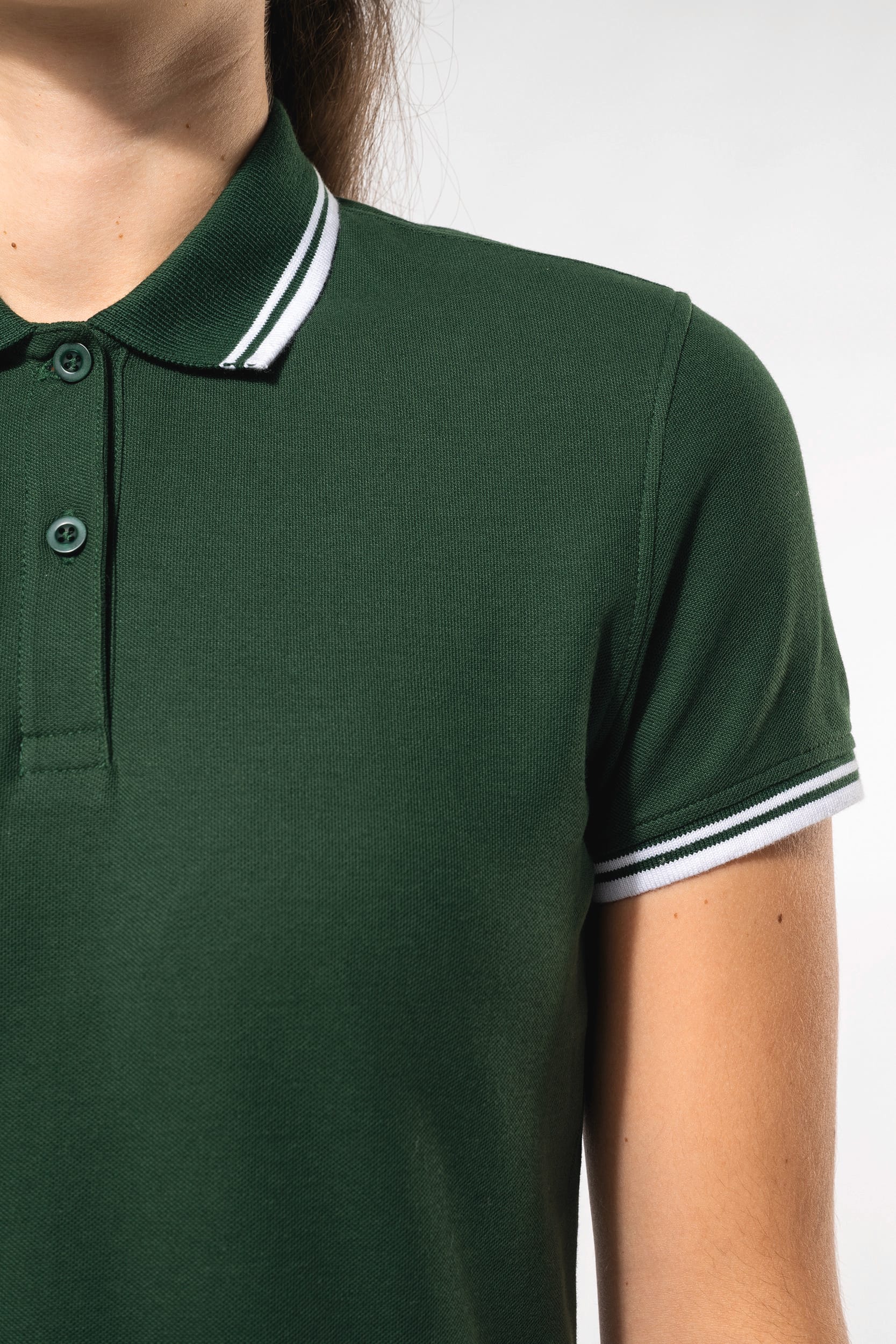 Polo femme manches courtes à liserés contrastés