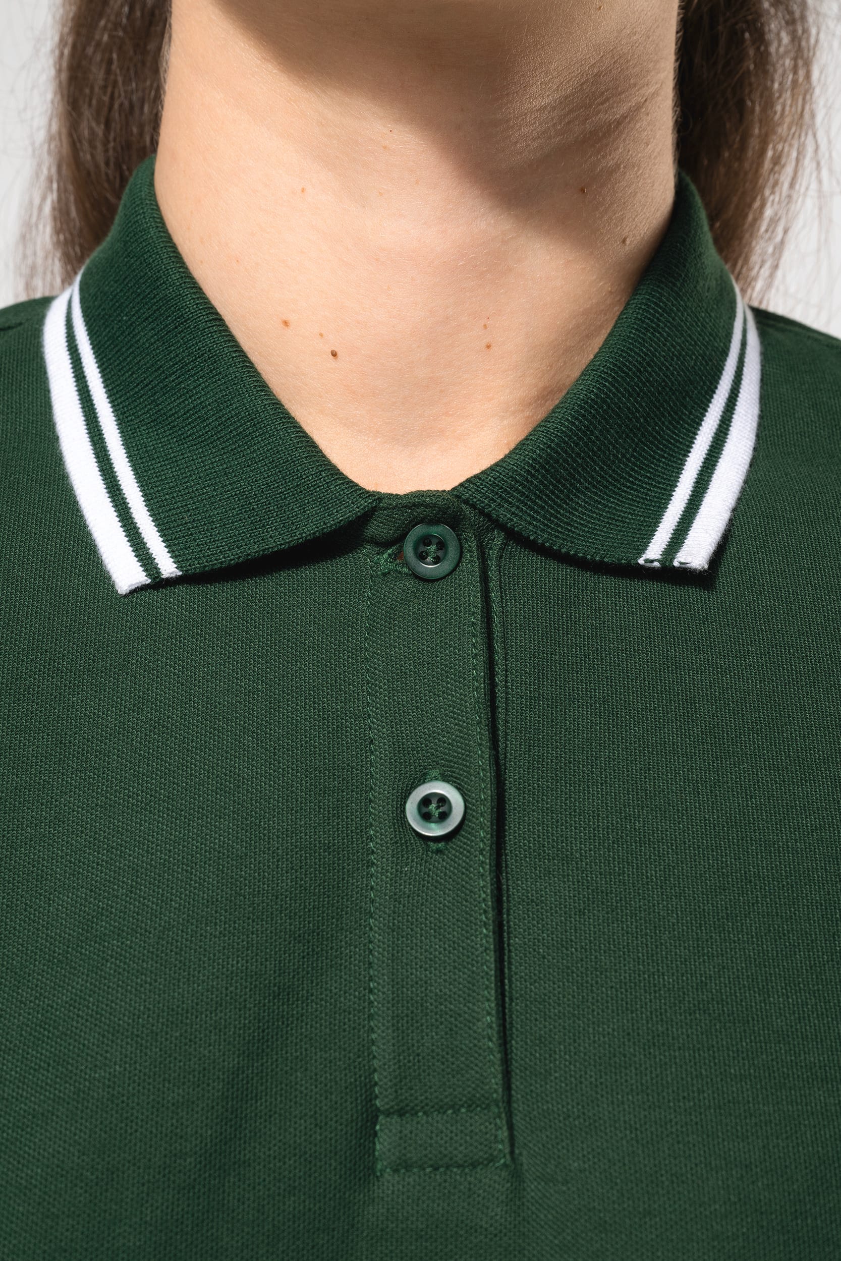 Polo femme manches courtes à liserés contrastés