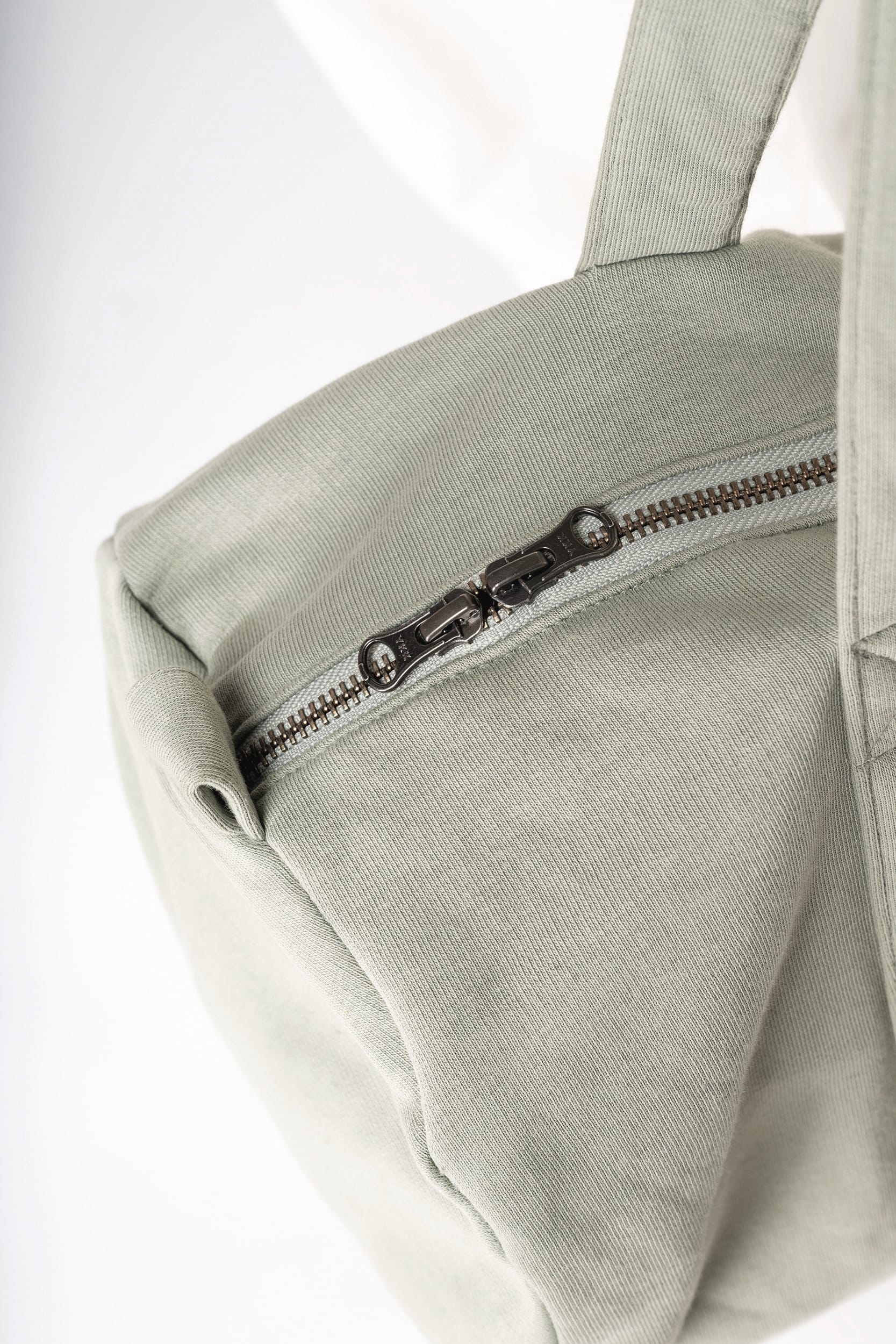 Saco cilíndrico em malha de sweat