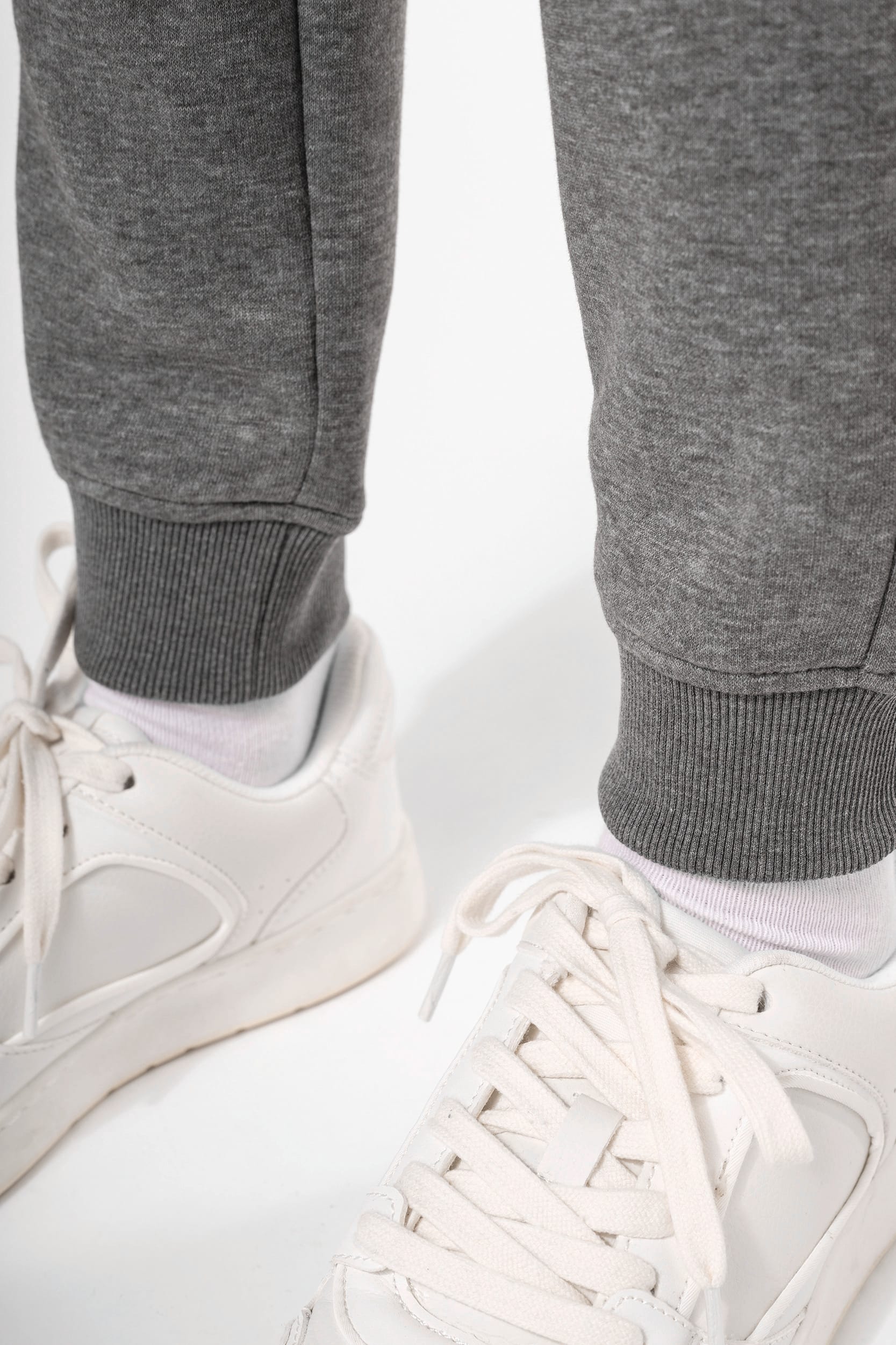 Calças multidesportos com bolsos de criança