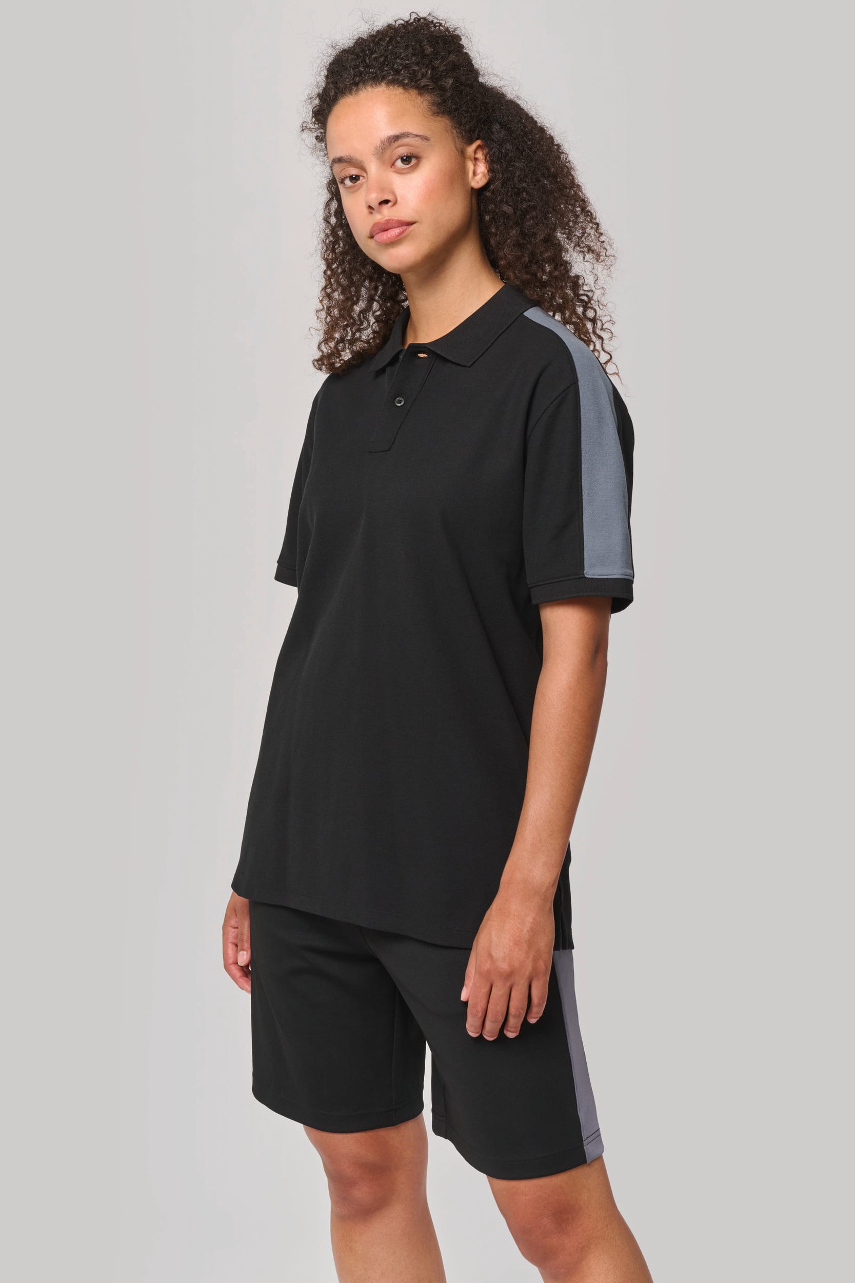 Polo de equipo bicolor unisex
