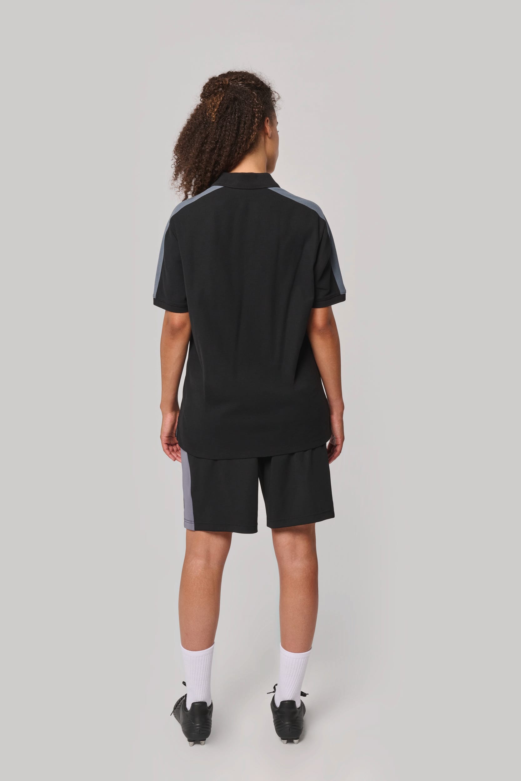 Polo de equipo bicolor unisex