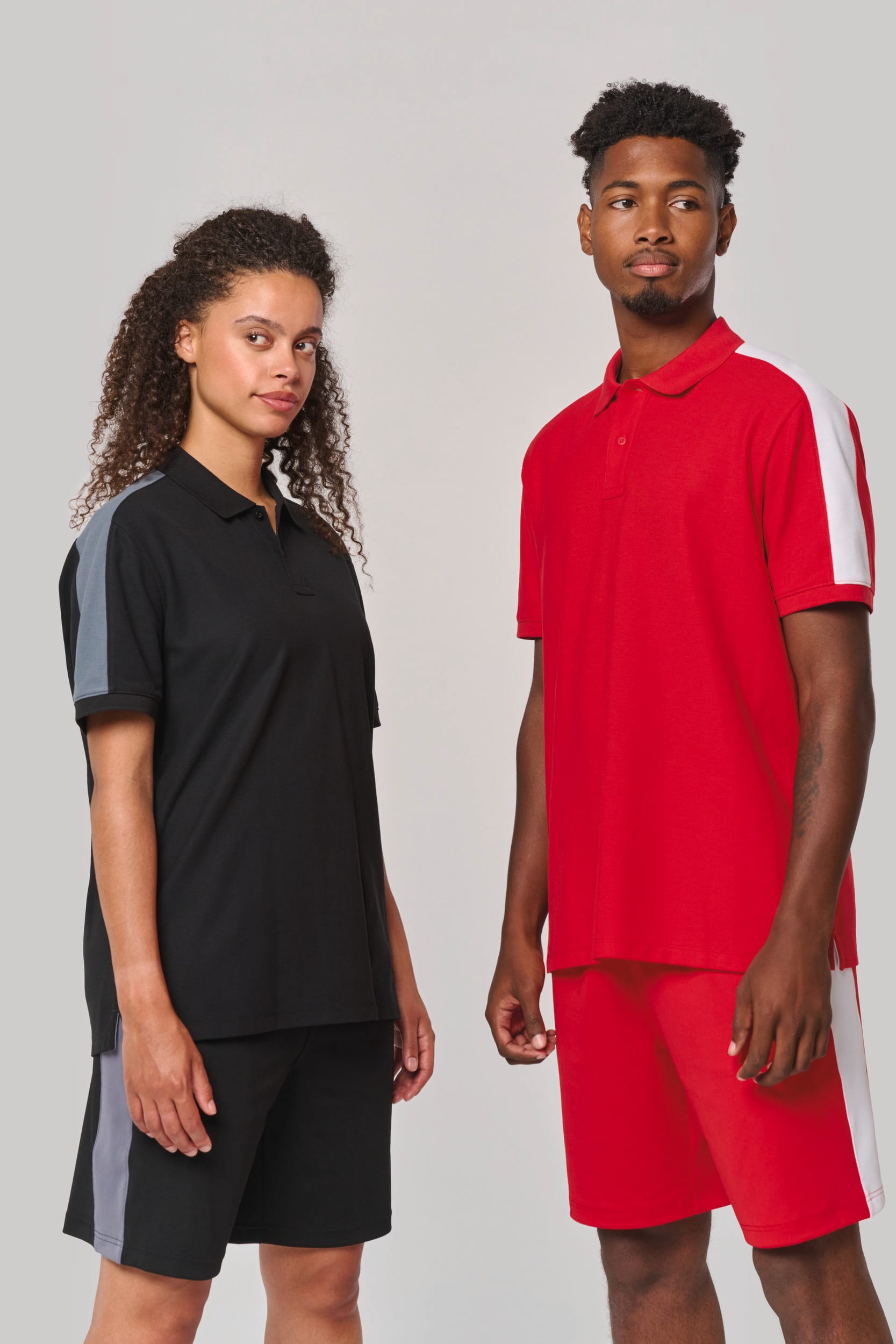 Polo de equipo bicolor unisex