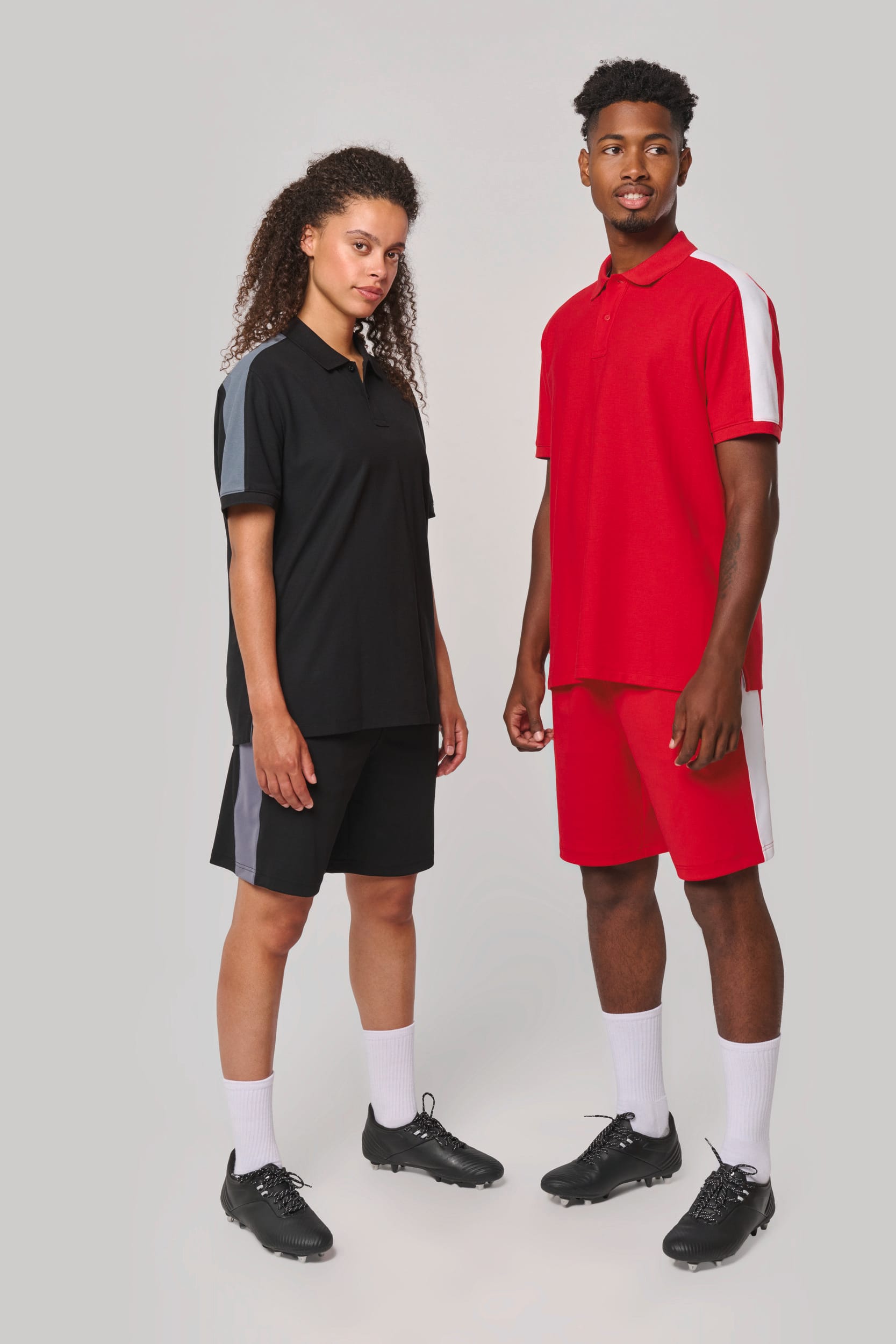 Polo de equipo bicolor unisex