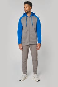 Veste molleton zippée capuche bicolore unisexe porté par un homme
