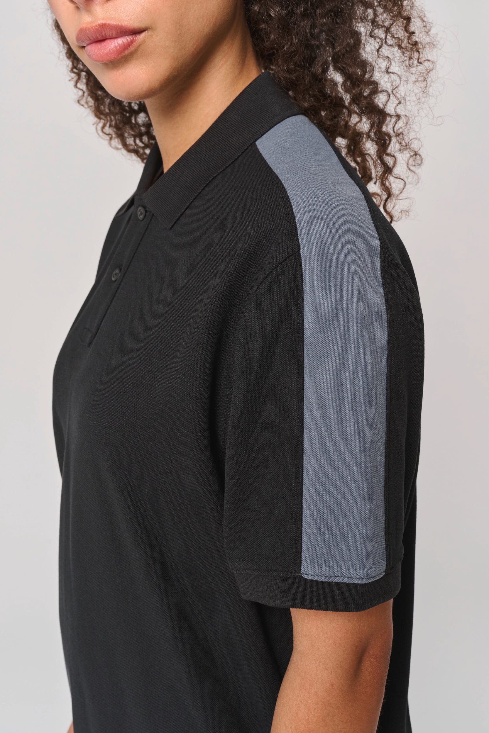 Polo de equipo bicolor unisex