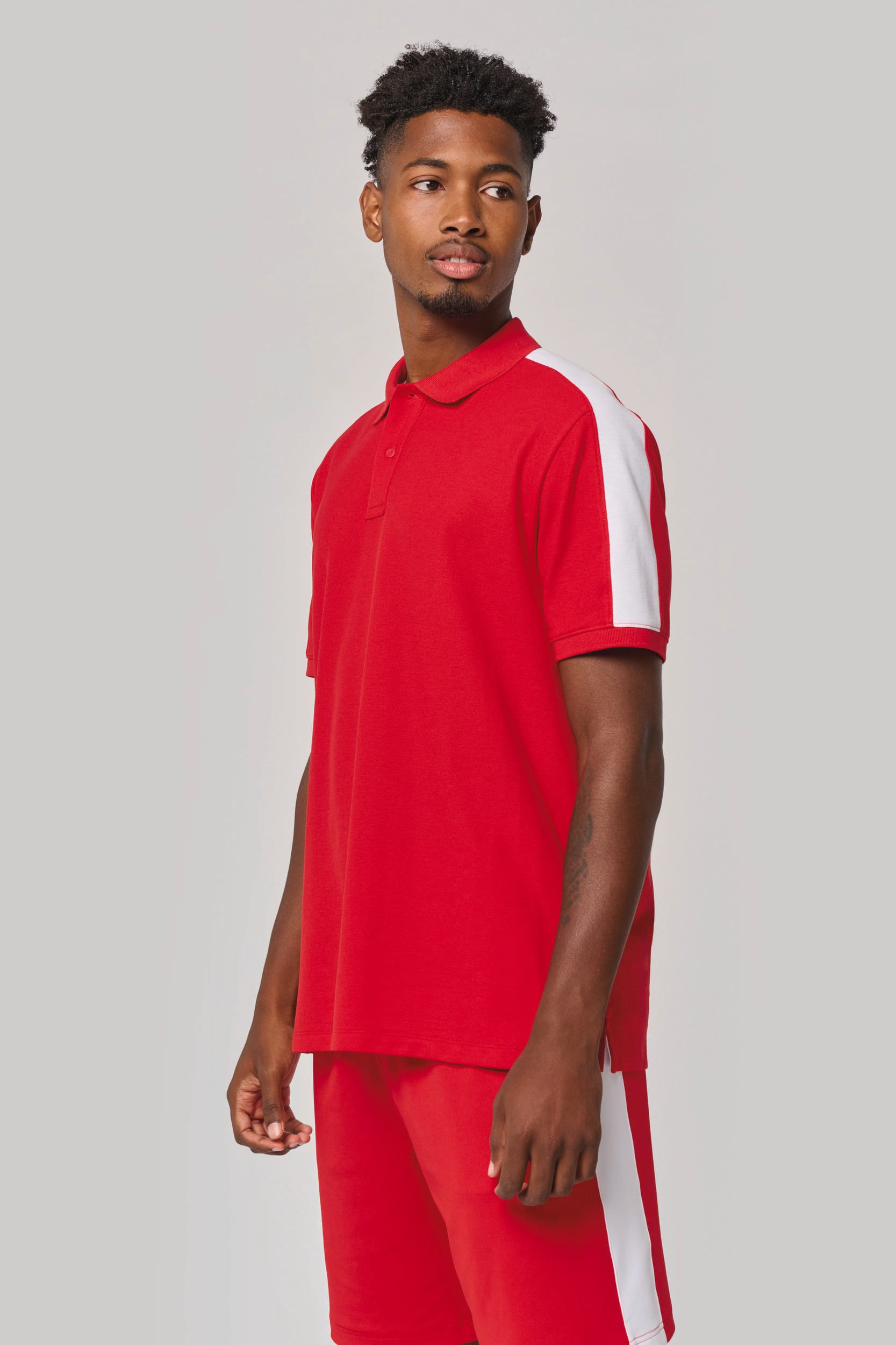 Polo de equipo bicolor unisex