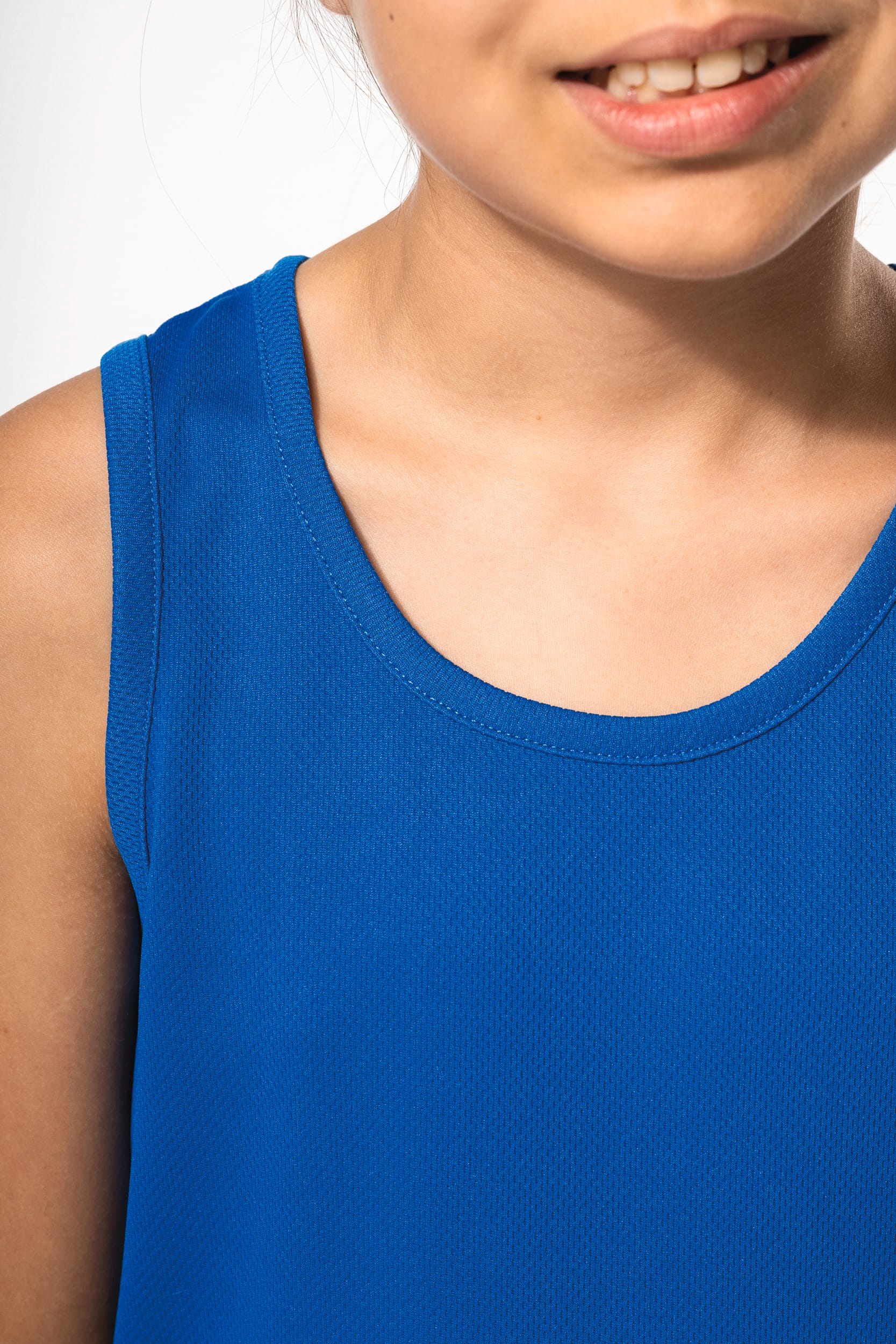 T-shirt de desporto sem manga de criança