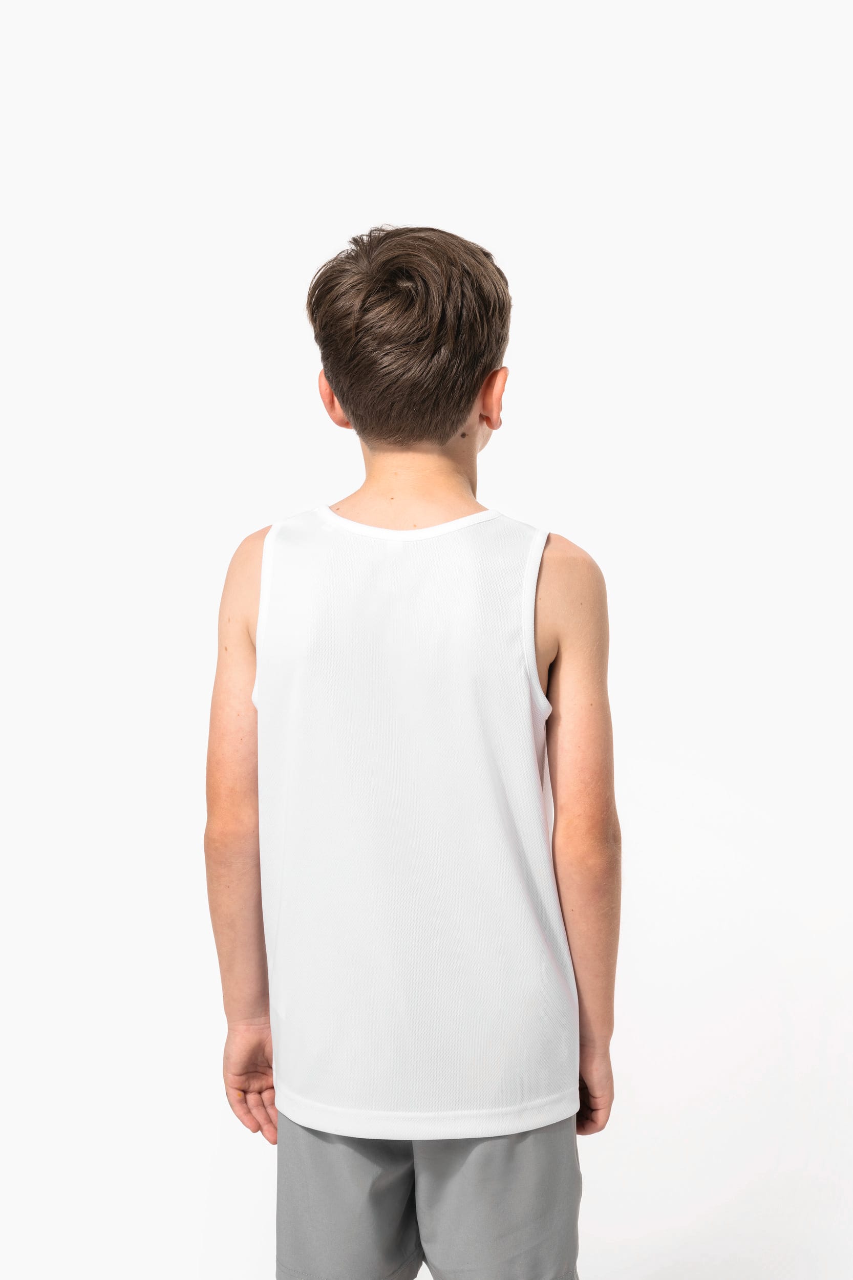 T-shirt de desporto sem manga de criança