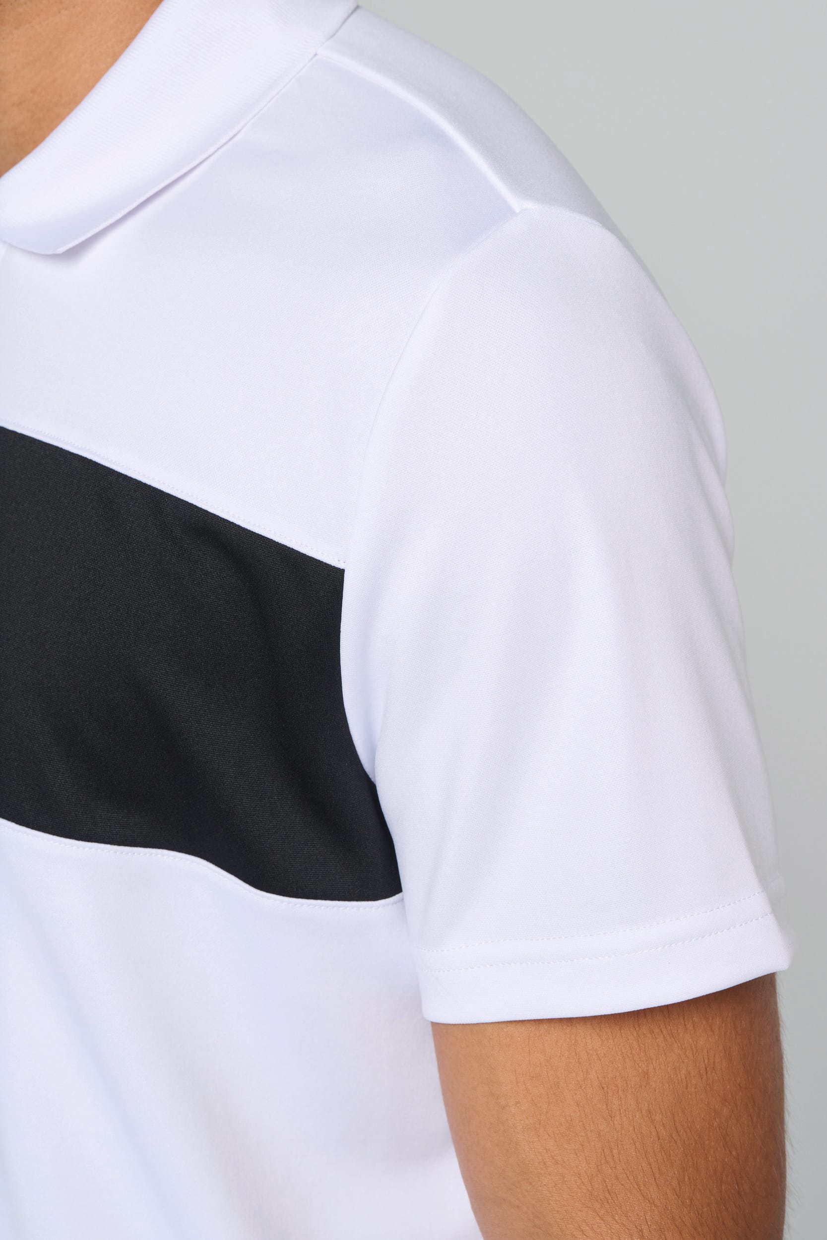 Polo manga curta de adulto