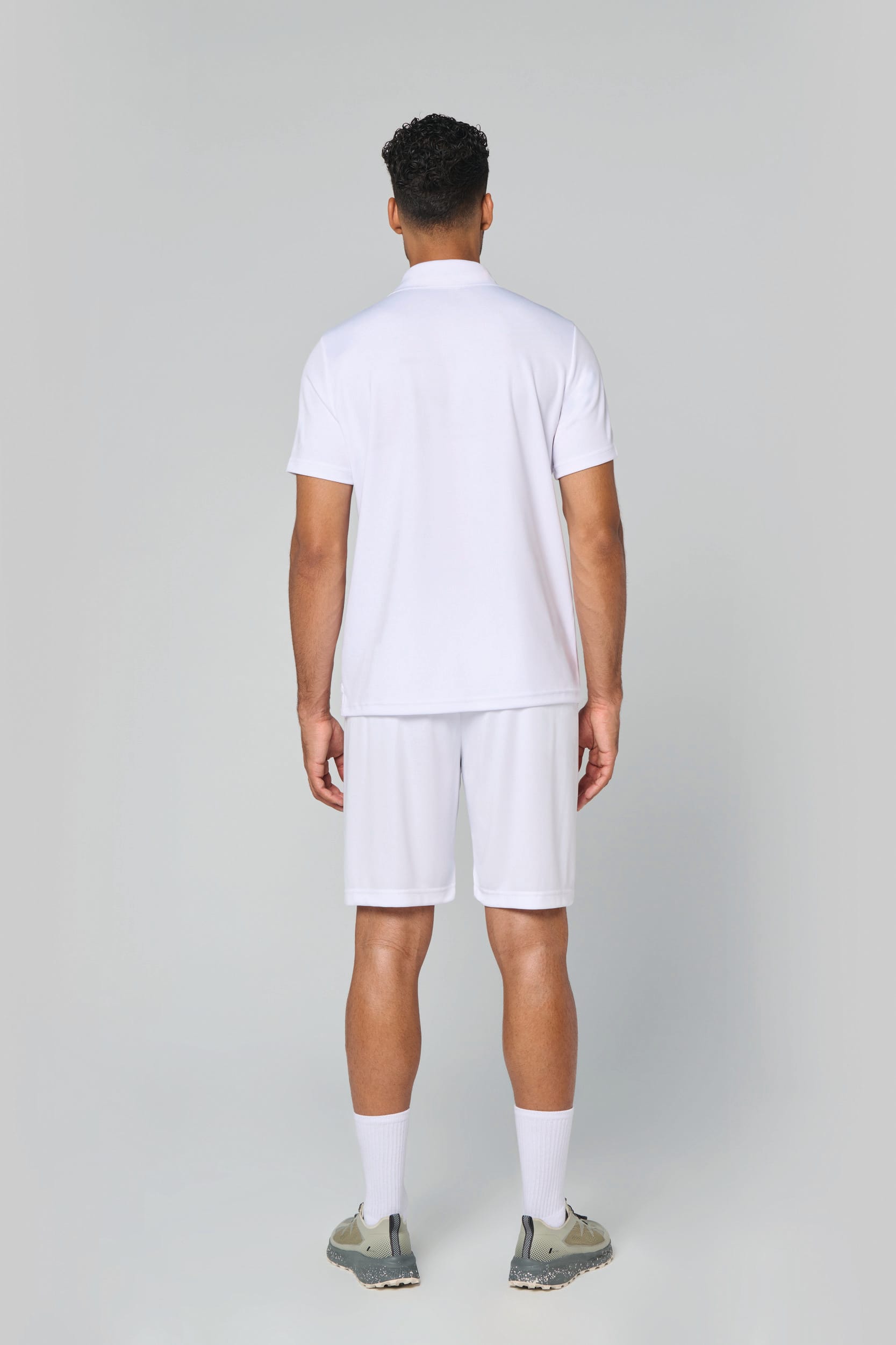 Polo manga curta de adulto