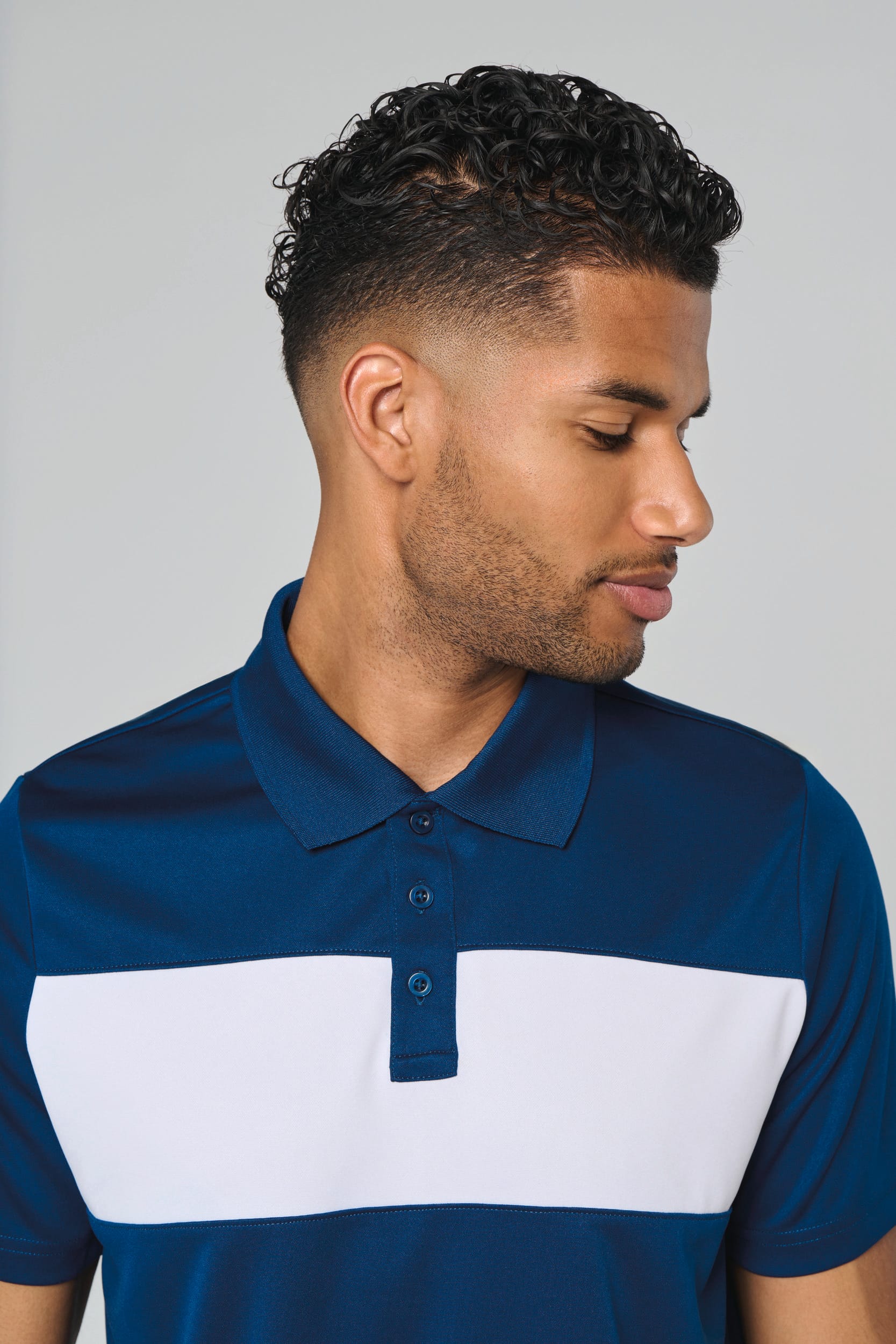 Polo manga curta de adulto