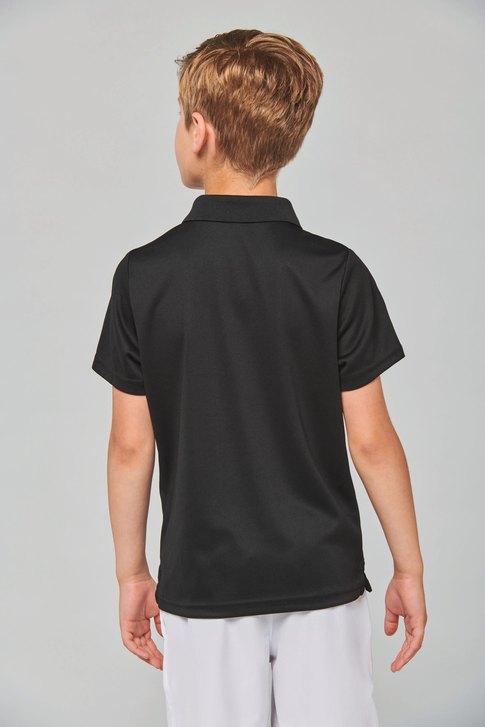 Polo manga curta de criança