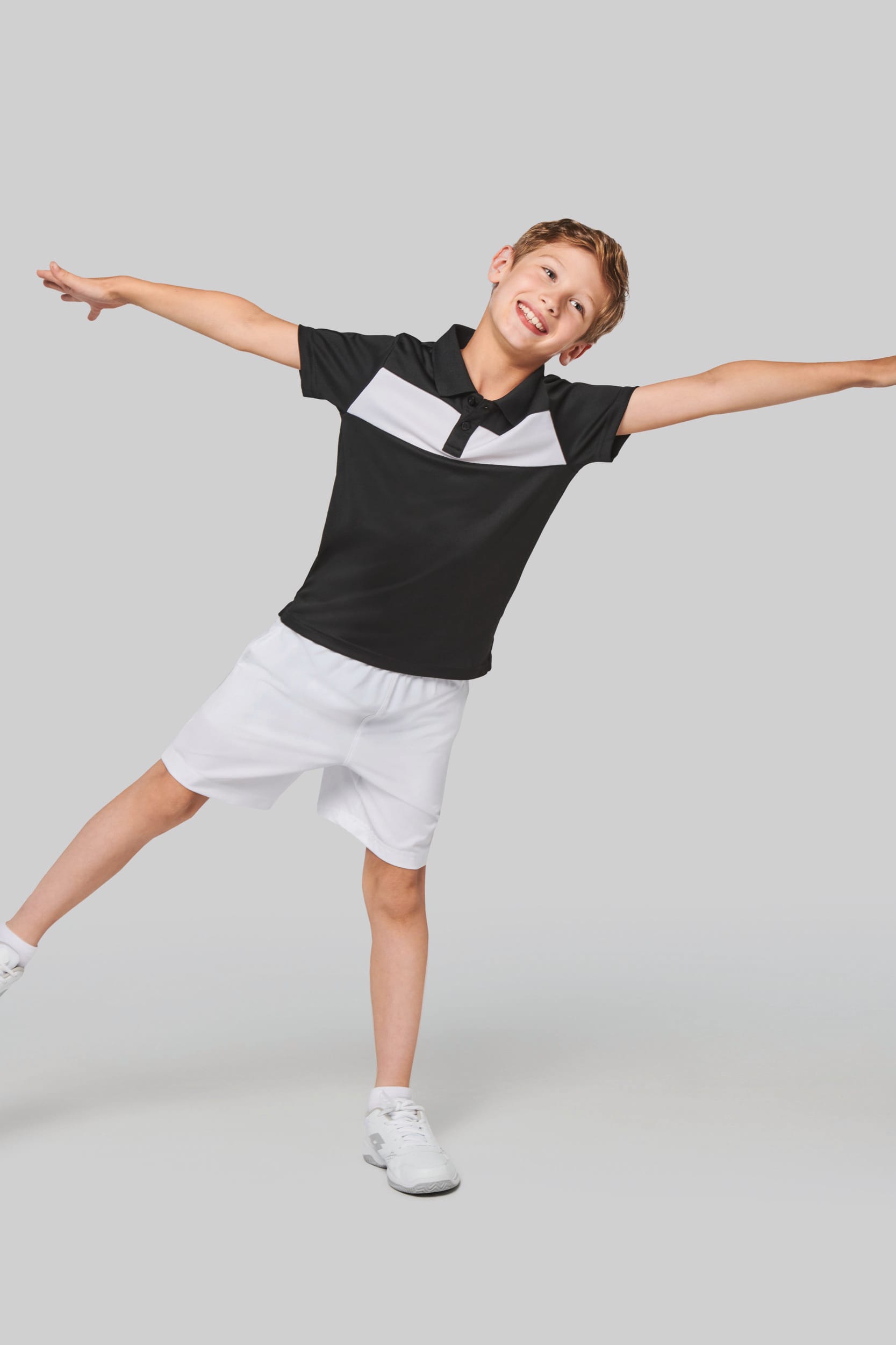 Polo manga curta de criança