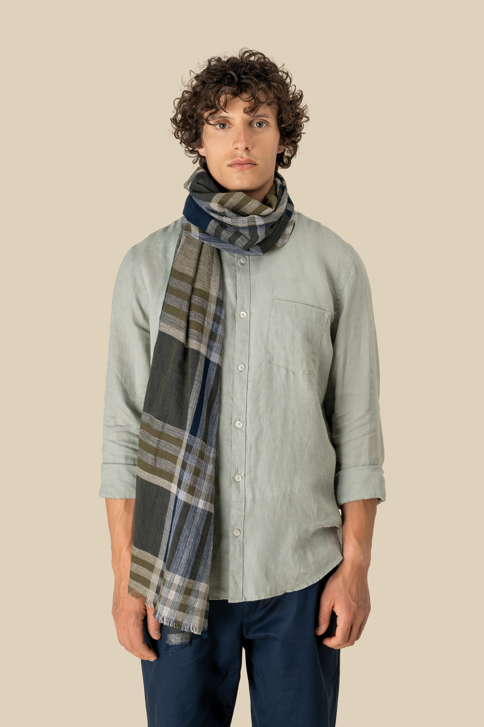 Uniseks tulbanddoek met ruit- en streepmotief.