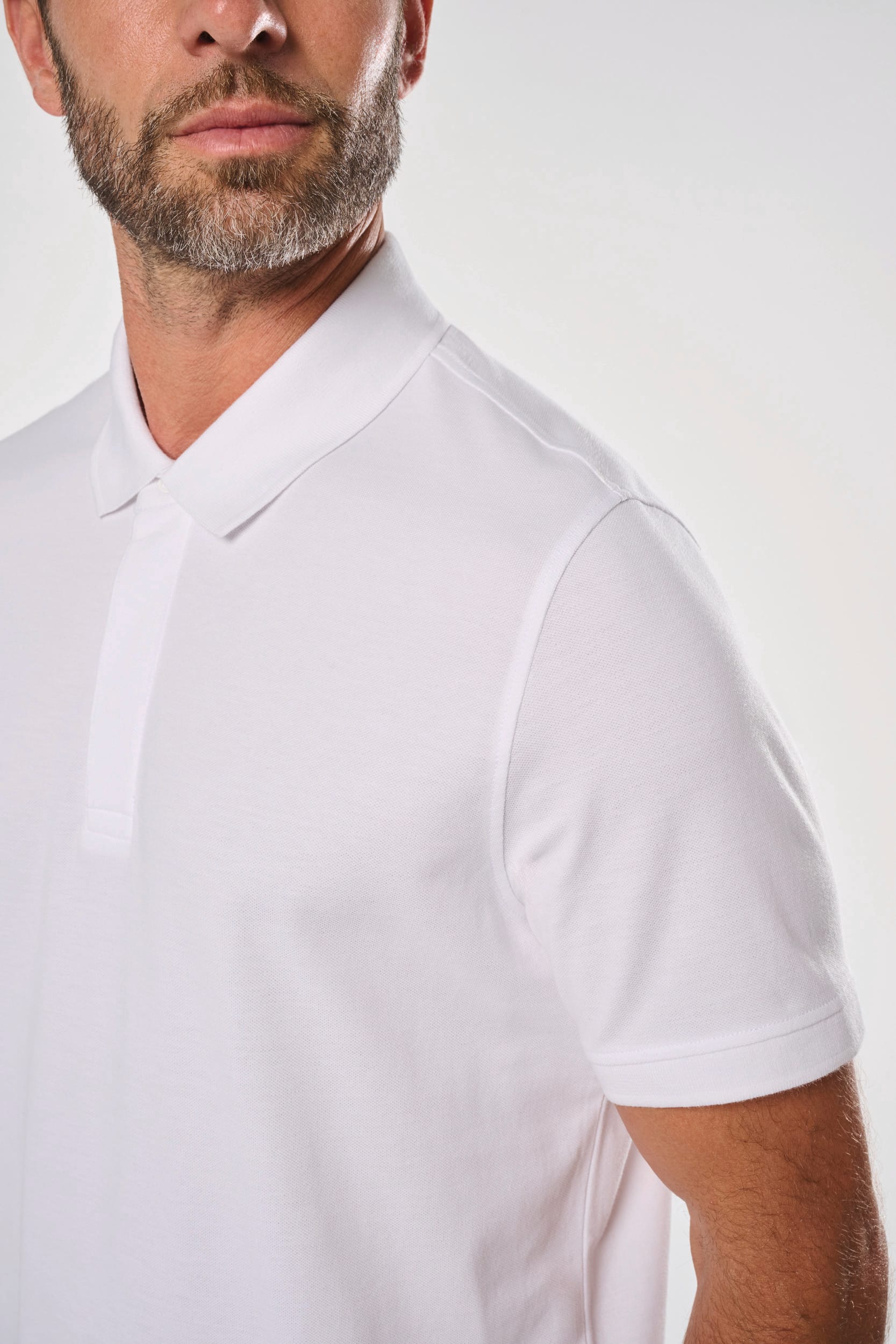 Polo col boutons pression manches courtes homme