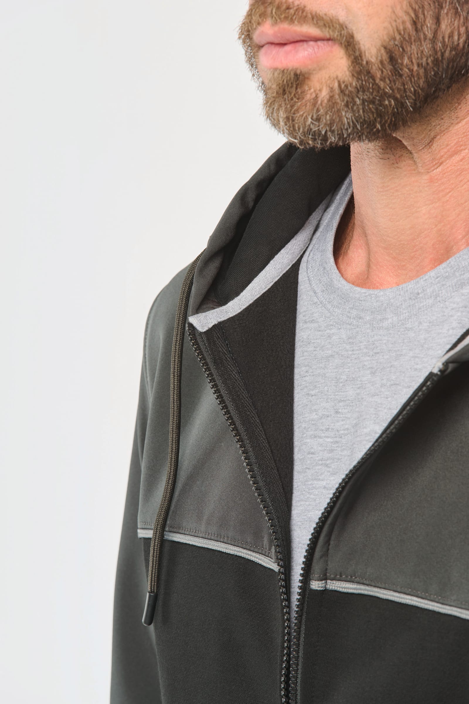 Tweekleurig ecologisch fleecevest met capuchon